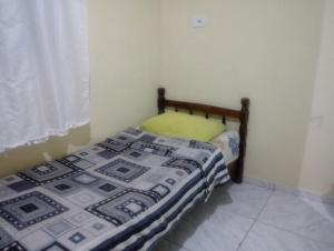 Cama o camas de una habitación en Casa Caiobá