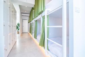 Postel nebo postele na pokoji v ubytování W3 HOSTEL