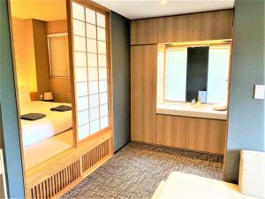 Miru Niseko客房内的一张或多张床位