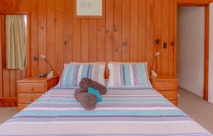 Postel nebo postele na pokoji v ubytování Anson Bay Lodge