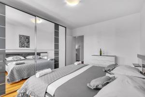 Posteľ alebo postele v izbe v ubytovaní Apartment Ivo Makarska