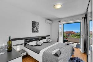 Posteľ alebo postele v izbe v ubytovaní Apartment Ivo Makarska