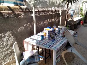 a table and chairs sitting on a patio at Apollon Apartments H-2 in Rhodes Town