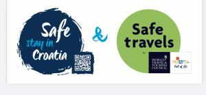 two stickers with the text safe stay in croatia and a safe stay in at Apartments Maritea in Vodice
