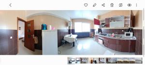 Kuchyň nebo kuchyňský kout v ubytování Residence AL Massira CGI Fnideq plage