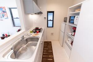 CuteFamilyHouse! 6minShinjuku 6minSta FreeParking Cozy,Bright KidsFree Under6yrs的厨房或小厨房