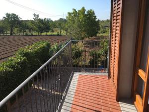 A balcony or terrace at Tuscan Dream Casa Vacanze