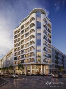 a rendering of a large white building at iRest COSMOPOLIS Vinh Yen in Yen