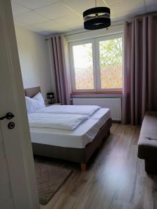 Katil atau katil-katil dalam bilik di Zielone Wzgórze