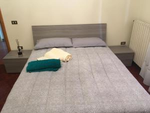 A bed or beds in a room at Tuscan Dream Casa Vacanze