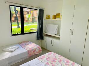 Katil atau katil-katil dalam bilik di Descanso com pé na areia! +33 gambar