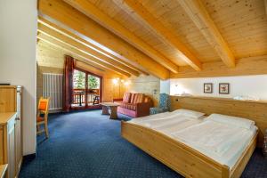 Postel nebo postele na pokoji v ubytování Hotel Salvan