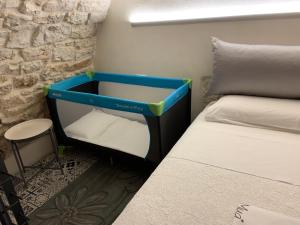 A bed or beds in a room at Dimora Le Zagare