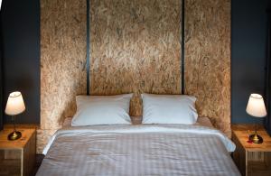 Postel nebo postele na pokoji v ubytování Huaysompoi Valley Nan