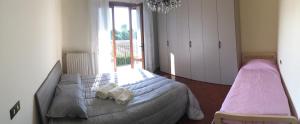 A bed or beds in a room at Tuscan Dream Casa Vacanze