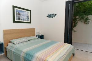 Posteľ alebo postele v izbe v ubytovaní Villa Sa Riera Begur vue mer panoramique et plage à pieds