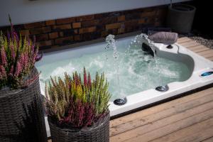 Fotografie z fotogalerie ubytování Unterschlupf Radeberg mit Garten & Whirlpool v destinaci Radeberg