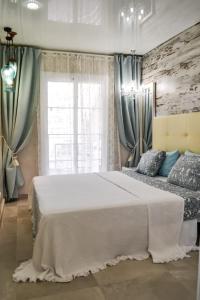 Posteľ alebo postele v izbe v ubytovaní Apartment Orlando Wave
