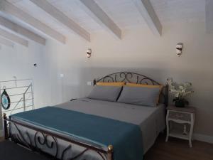 Postel nebo postele na pokoji v ubytování La Casa di Stefania LOFT