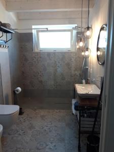Koupelna v ubytování La Casa di Stefania LOFT