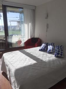 Postel nebo postele na pokoji v ubytování Playa Amarilla