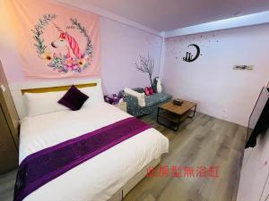 Postel nebo postele na pokoji v ubytování E-Phone Homestay