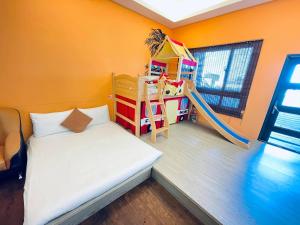 Postel nebo postele na pokoji v ubytování E-Phone Homestay + 11 fotografií