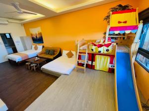 Postel nebo postele na pokoji v ubytování E-Phone Homestay