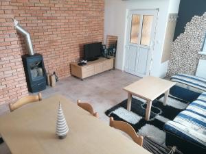 TV a/nebo společenská místnost v ubytování Rogla - Apartma ROŽLE