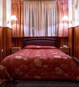 Voodi või voodid majutusasutuse Hotel Bitouni toas