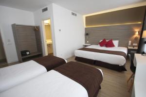 Postel nebo postele na pokoji v ubytování Hotel BESTPRICE Diagonal