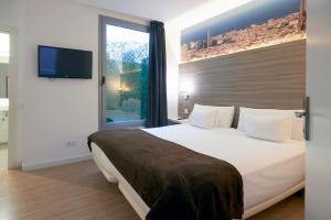 Postel nebo postele na pokoji v ubytování Hotel BESTPRICE Diagonal