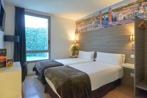 Postel nebo postele na pokoji v ubytování Hotel BESTPRICE Diagonal