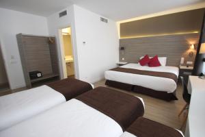 Postel nebo postele na pokoji v ubytování Hotel BESTPRICE Diagonal