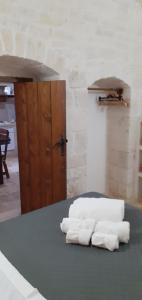 A bed or beds in a room at Trullo Gio