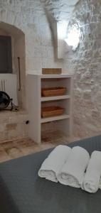 A bed or beds in a room at Trullo Gio
