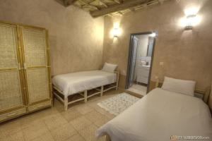 Guest House Bagdad Café客房内的一张或多张床位