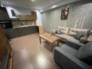 Η κουζίνα ή μικρή κουζίνα στο One Central Apartment +52 φωτογραφίες