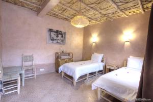 Guest House Bagdad Café客房内的一张或多张床位
