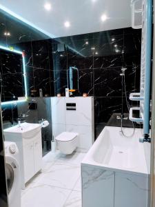 Kúpeľňa v ubytovaní Apartamenty Niebo