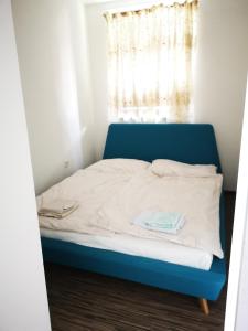 Posteľ alebo postele v izbe v ubytovaní Útulný byt na Fončorde