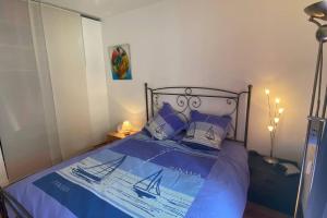 Łóżko lub łóżka w pokoju w obiekcie Cosy T3 spacieux idéalement situé hyper centre