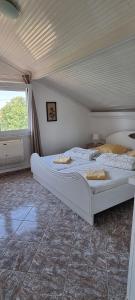 Кровать или кровати в номере Villa Tikozidis