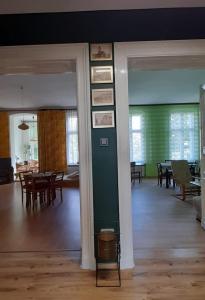 a living room with a table and a dining room at Apartament Kasztanowy in Gliwice