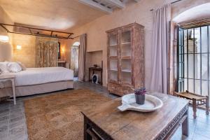 Łóżko lub łóżka w pokoju w obiekcie Hotel Boutique V