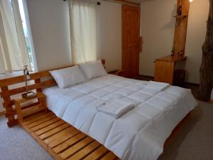 Katil atau katil-katil dalam bilik di Bonanza Hospedaje