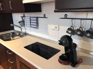 Kuchyňa alebo kuchynka v ubytovaní Isleta apartamento con terraza, vistas y WIFI