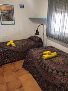 Posteľ alebo postele v izbe v ubytovaní Isleta apartamento con terraza, vistas y WIFI