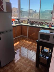 Una cocina o cocineta en Hotel Perla Mazatlan 35 fotos más
