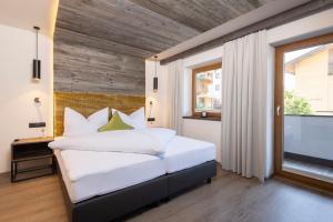 Posteľ alebo postele v izbe v ubytovaní Stocker´s Wohlfühlapartments